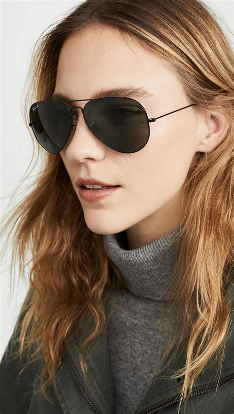 oversized black aviator ray bans.